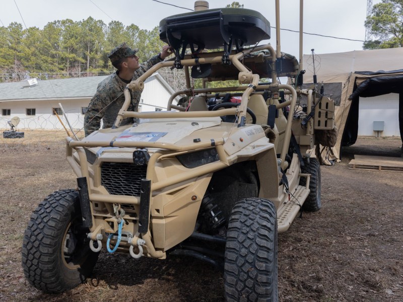 Military specialists test a Kymeta satellite terminal attached to a command-and-control all-terrain tactical vehicle during an exercise at Fort Barfoot, Virginia. Credit: U.S. Marine Corps photo by Pfc. Christian Alston